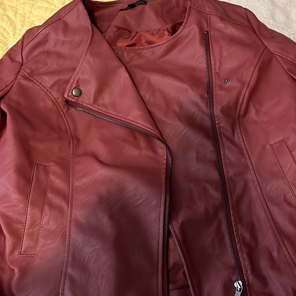 Red leather jacket.